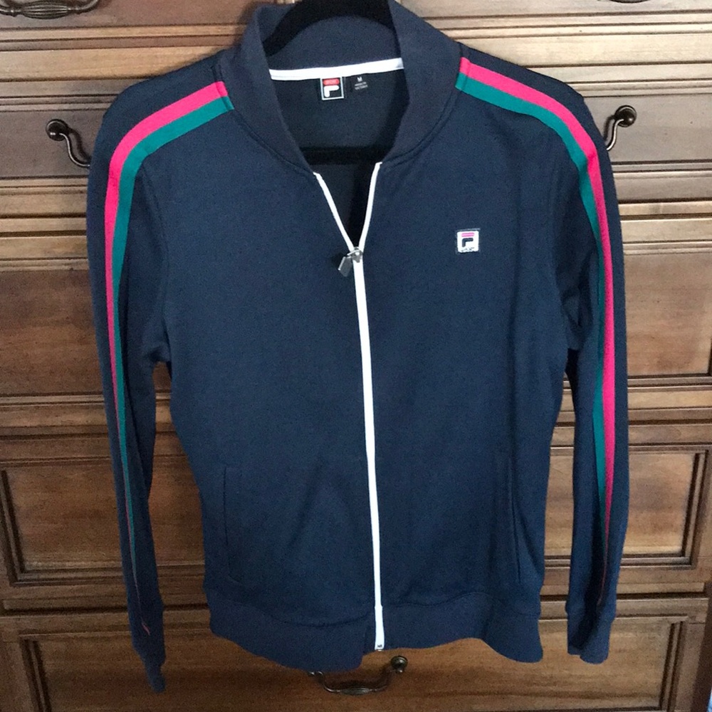 Fila athletic zipper front blue jacket with pretty stripes down the sleeves .